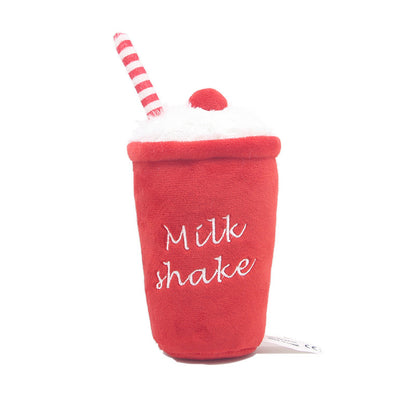 Red plush milkshake with white embroidered "Milk shake" text, fluffy white top, cherry and striped straw.
