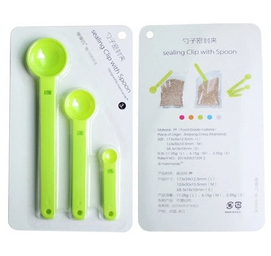 Set of three lime-green spoon-shaped bag-sealing clips in clear blister pack next to printed product backing.