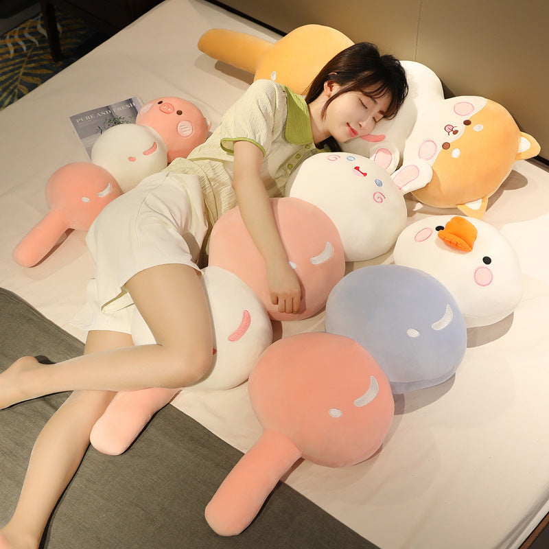 Candied fruit skewer plush pillows on a bed