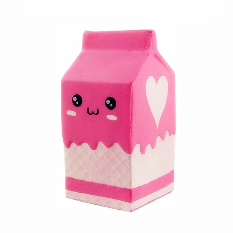 Pink Milk Carton squishy stress toy with a smiley face, 12 x 7.5 x 7.5 cm