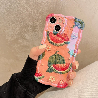 One glossy pink phone case with textured watermelon slices, small flowers, wavy edges and dual camera cutout.