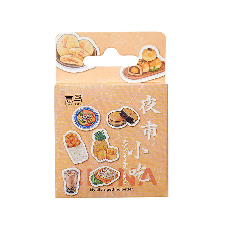 One peach-orange sticker pack box showing eight illustrated night-market snacks (pineapple, bubble tea, bun...