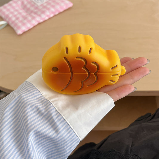 Taiyaki AirPods case held in a hand