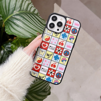 Colourful iPhone case featuring cherry blossom designs and playful motifs like hearts and peace symbols on a black backgro...