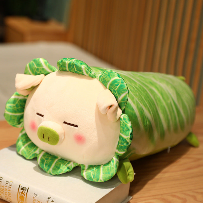 Cabbage pig plush pillow with a sleepy squinting face