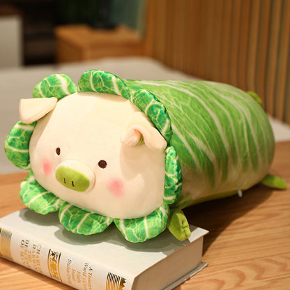 Cabbage pig plush pillow with round eyes on a table