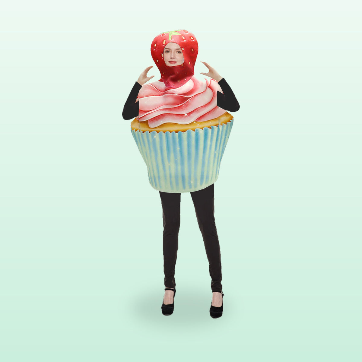 Adult strawberry cupcake costume with a strawberry hood, worn by a woman, on a soft mint background