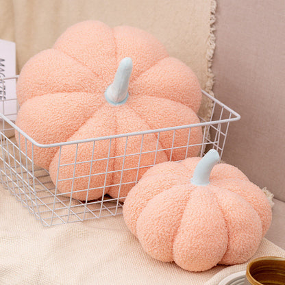 Blossom pink teddy pumpkin plush cushions in a wire basket in two sizes