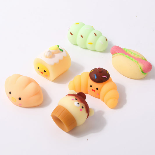 Mini bakery squishies: croissant, hot dog, cake roll and bear cupcake