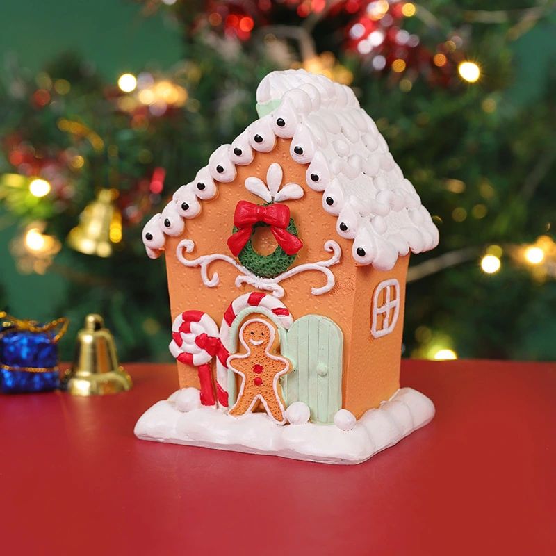 Gingerbread house ornament with an icing roof