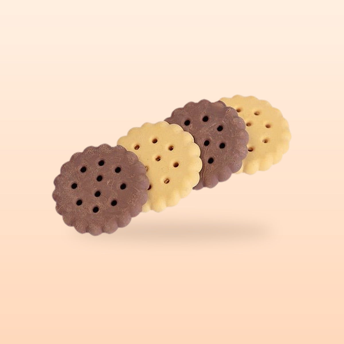 Four biscuit erasers in plain and chocolate, on a peach background