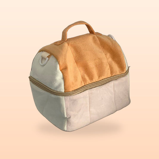 Large bread loaf zip storage bag with a top handle, on a peach background