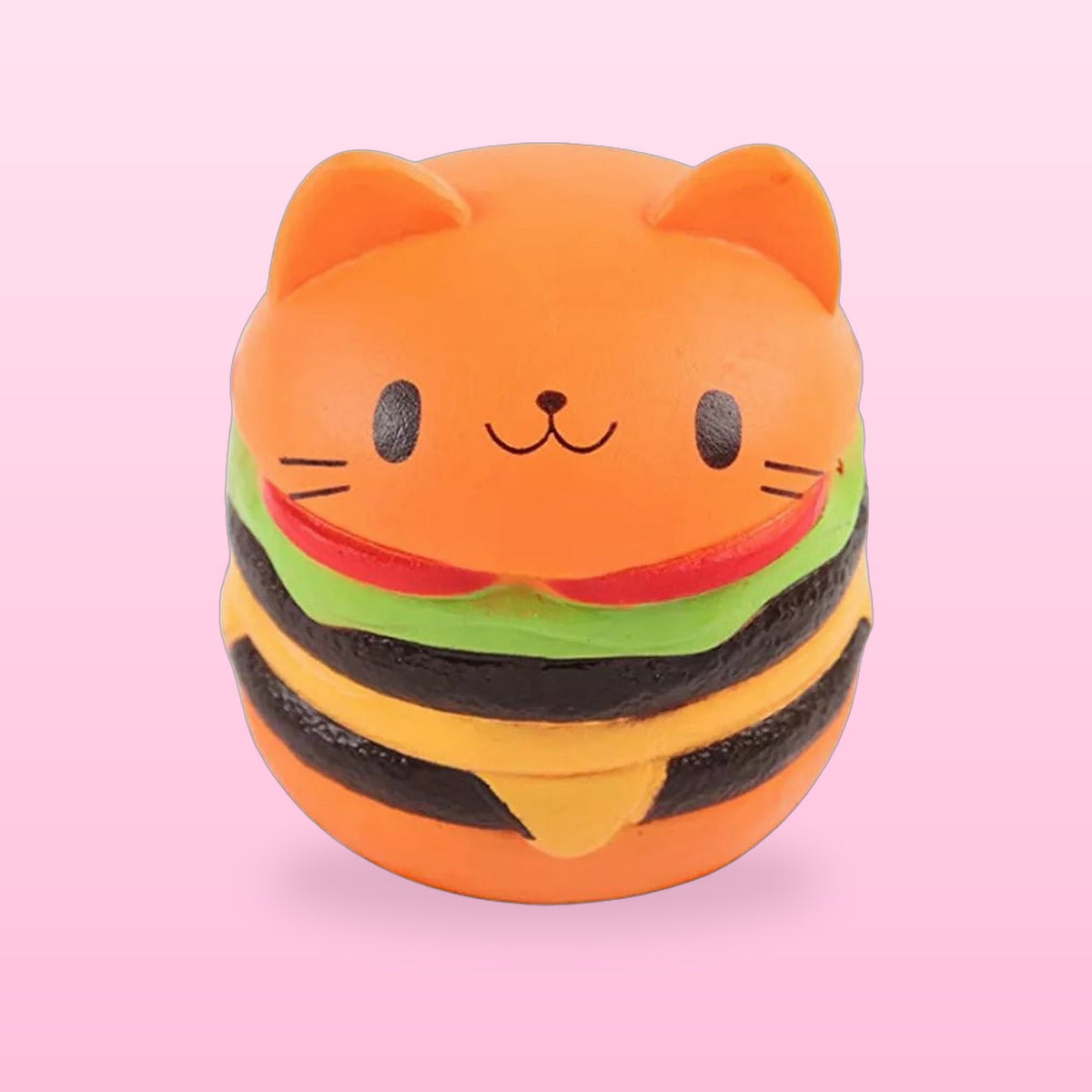 Orange cat face burger squishy stress toy, on a bubblegum pink background