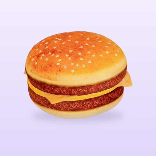 Burger plush cushion with a sesame seed bun, patties and cheese, on a soft lilac background