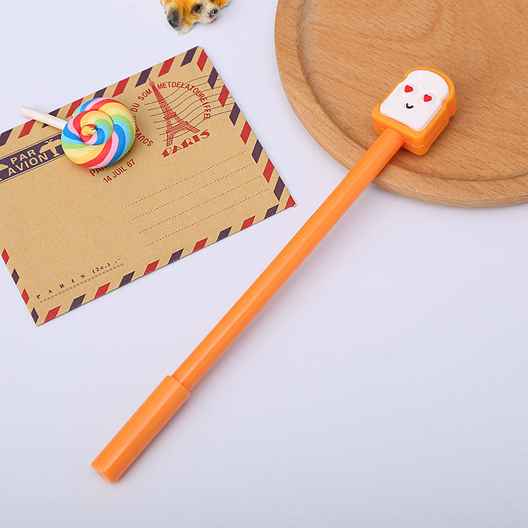 Orange gel pen with a heart eyed toast topper