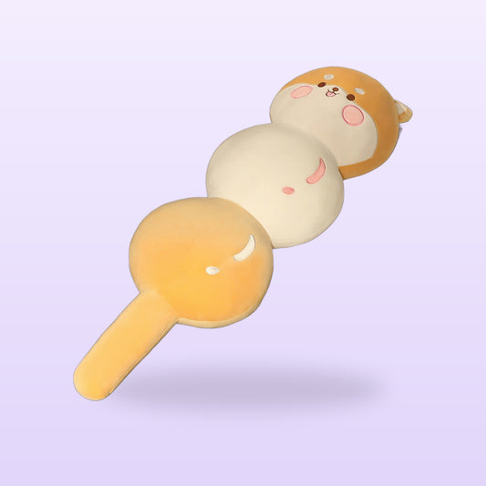 Shiba candied fruit skewer plush pillow in orange and cream, on a lilac background