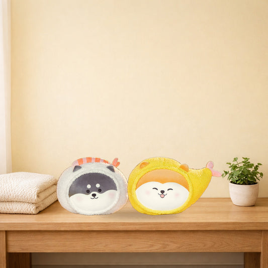 Shiba sushi and tempura prawn plush pillows on a light oak console table