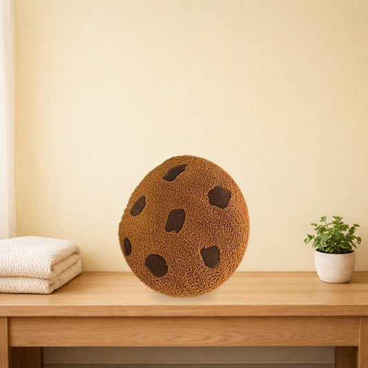 Choc chip cookie plush cushion on a light oak bench