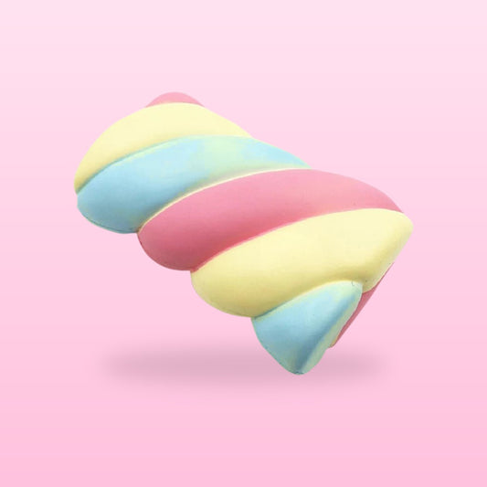 Rainbow cotton candy marshmallow squishy in pastel pink, blue and yellow on a soft pink background
