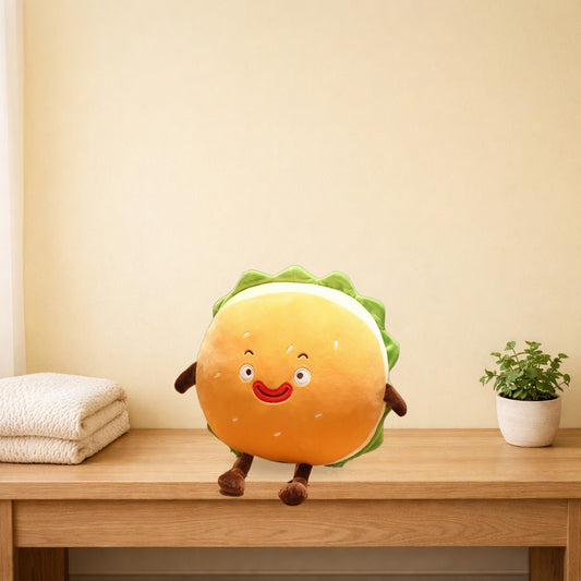 Winking burger plush cushion sitting on a light oak bench