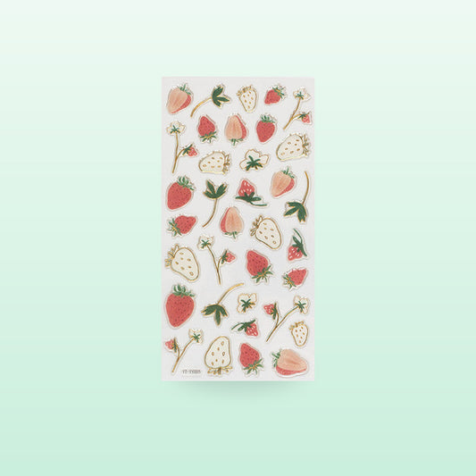 Strawberry metallic fruit sticker sheet with red and white berries and gold edges, on a soft mint background