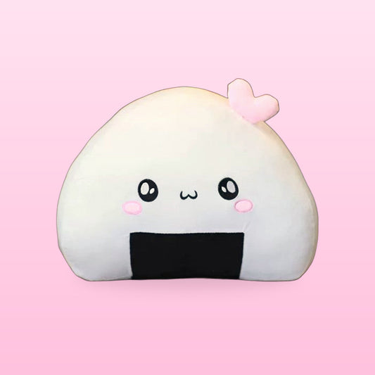 Rice ball plush pillow with a pink heart and seaweed wrap, on a soft pink background