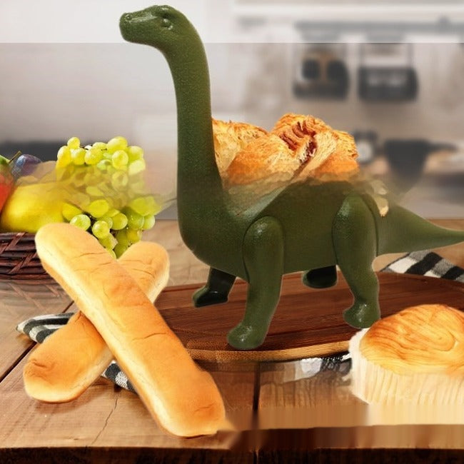 Dark green dino taco holder on a kitchen table