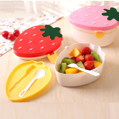 Strawberry lunch box opened with fruit inside