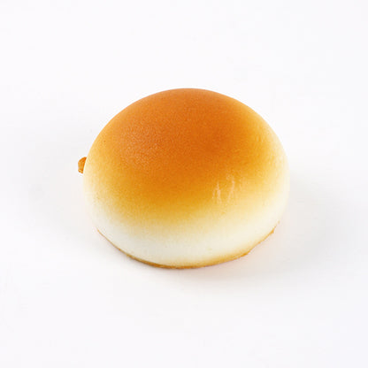 Golden bun squishy on a white background