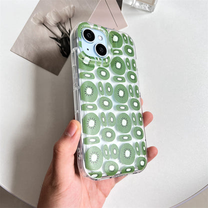 Hand holding one clear iPhone with a transparent case covered in repeating green kiwi slices.