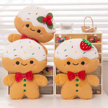 Three frosted gingerbread plushies on a shelf