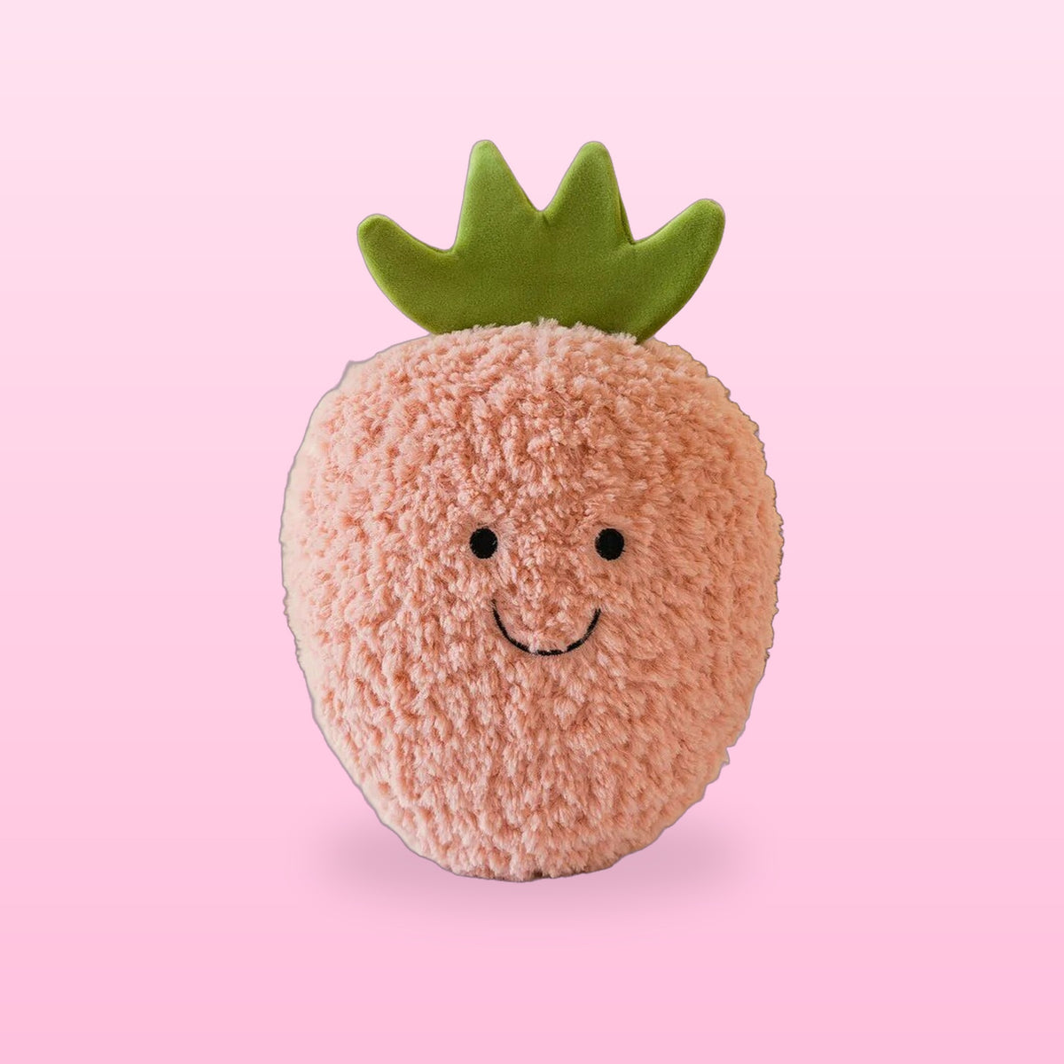 Fluffy pink strawberry plush with a smiley face and green leaves, on a bubblegum pink background