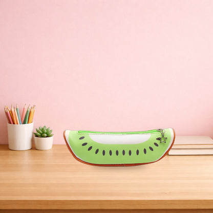 Green kiwi slice pencil case on a light oak study desk