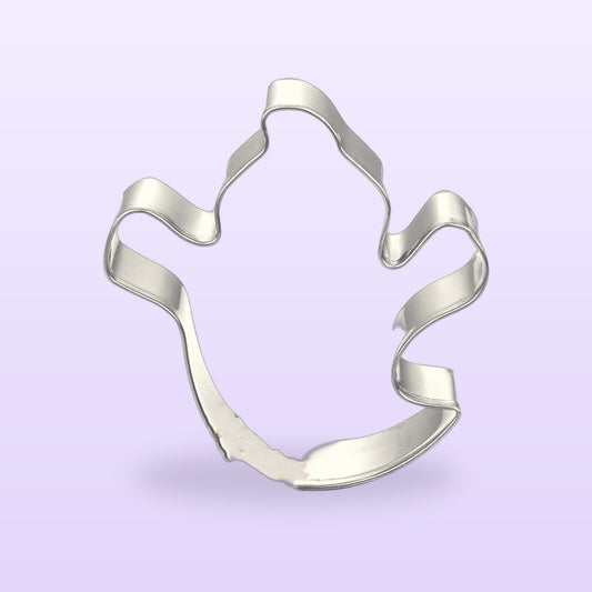 Silver stainless steel ghost cookie cutter, on a soft lilac background
