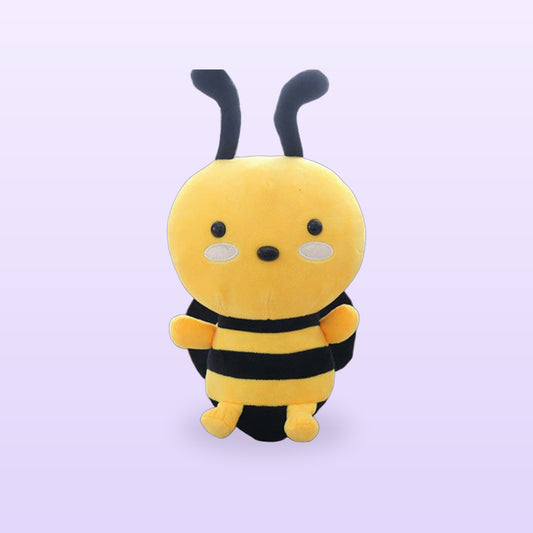 Yellow and black honeybee plush toy with little antennae, on a soft lilac background