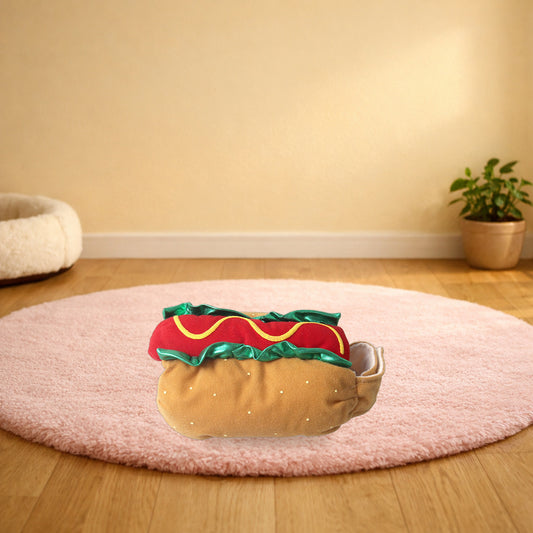 Hot dog pet costume lying on a pink rug in a living room