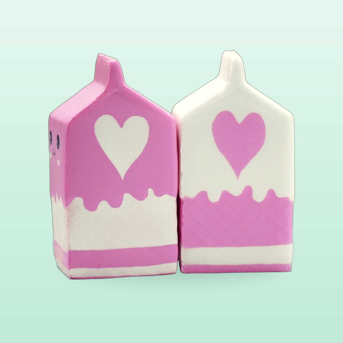 Back of the pink and white milk carton squishies showing the heart on each carton