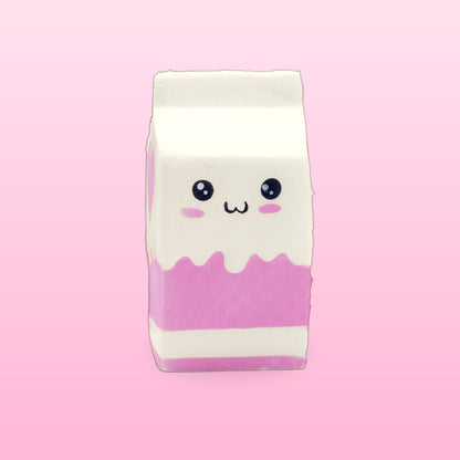 Milky white milk carton squishy with pink drips on a soft pink background