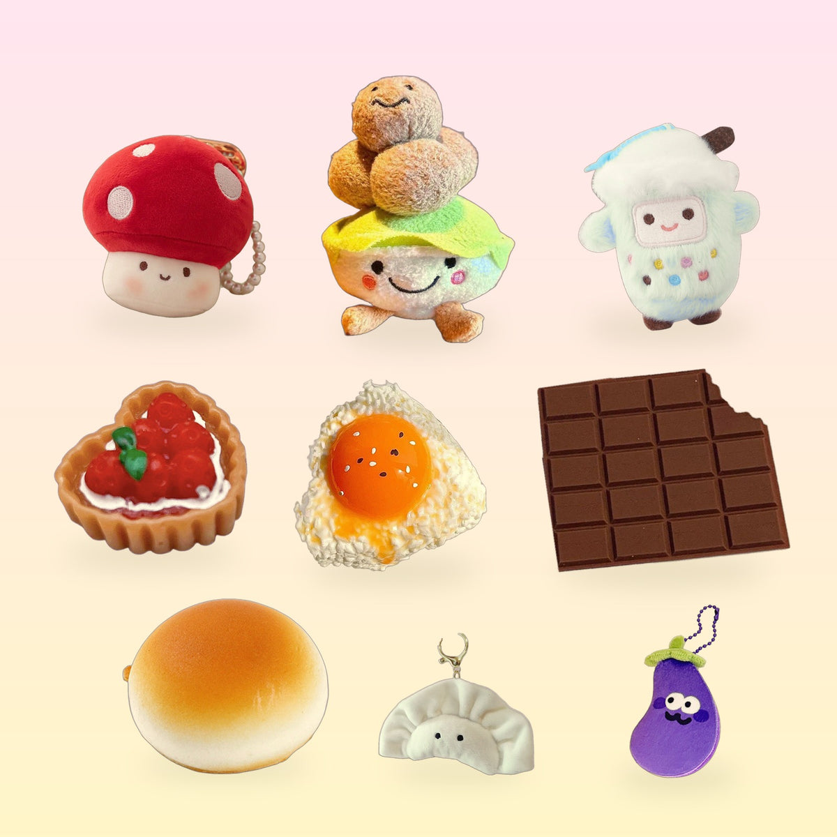 A mix of Scribble Snacks food-shaped plush charms, squishies and desk snacks on a pink and butter yellow background