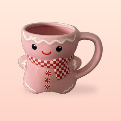 Pink Icing gingerbread man mug with a red check scarf and peppermint buttons