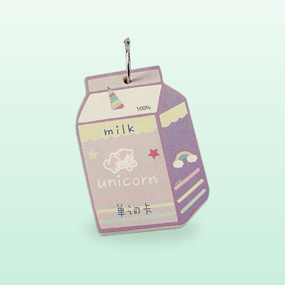 Milk carton mini notebook, lilac unicorn milk design with a metal ring, on a soft mint background
