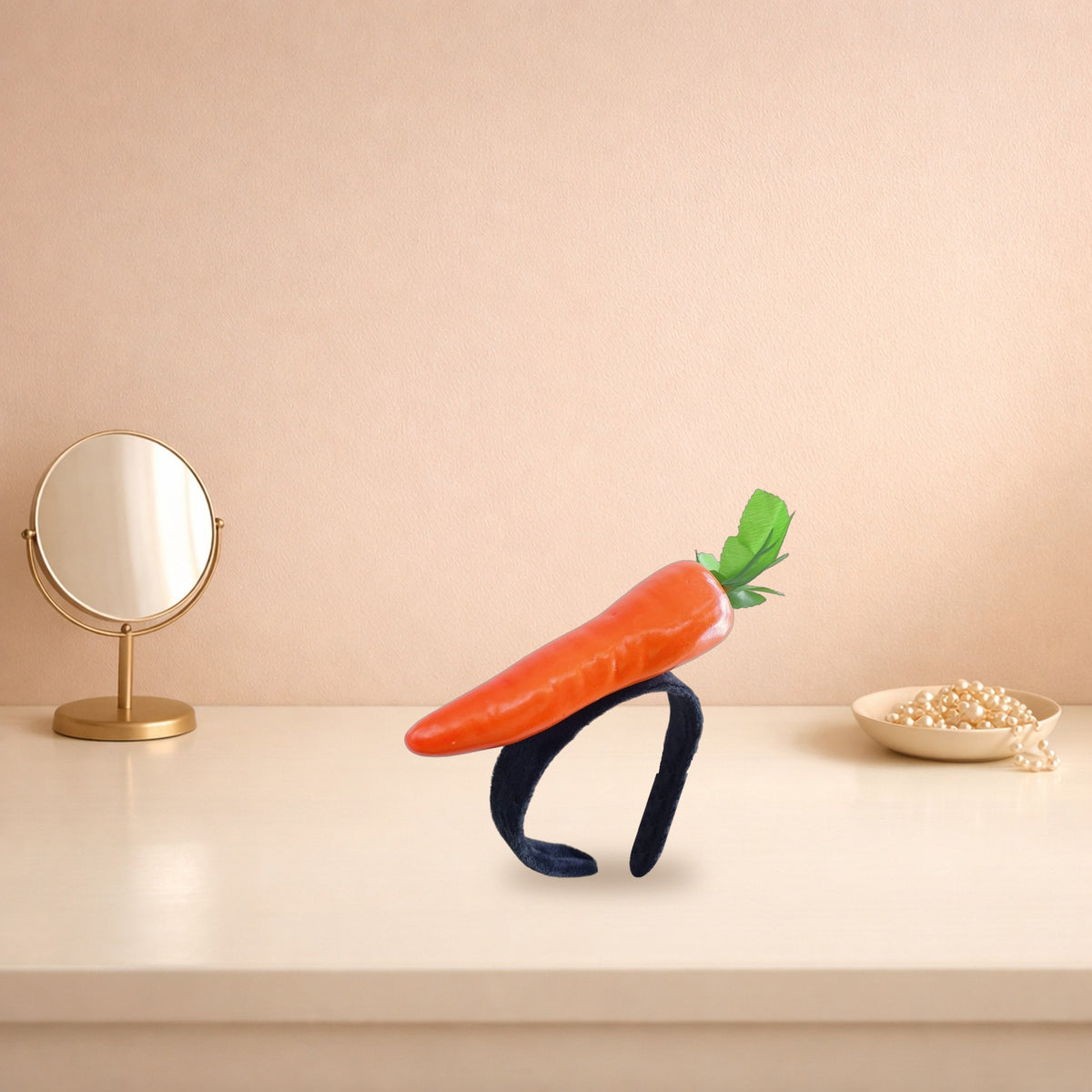 Carrot headband on a peach dressing table