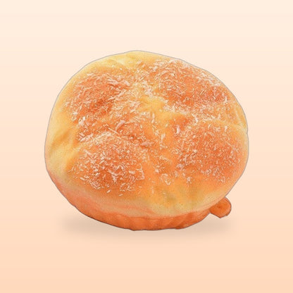 Sugar topped bun slow rise bread squishy on a soft peach background