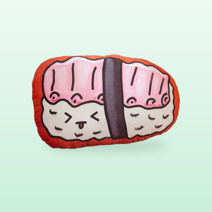 Cod sushi plush cushion in pink and white with a nori band and a cheeky face, on a mint background