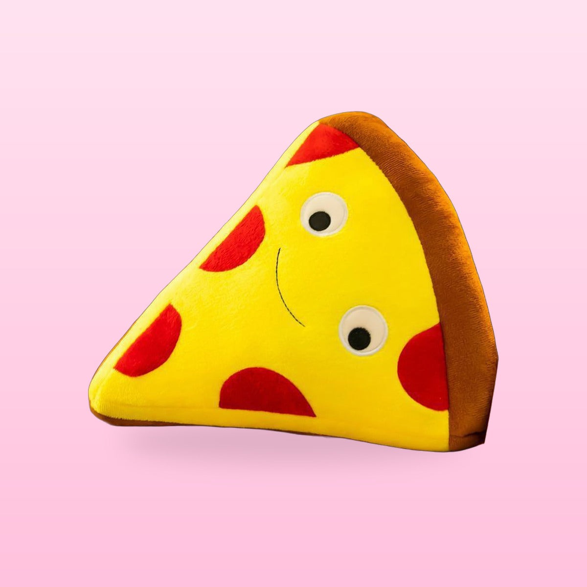 Pizza slice plush pillow with red pepperoni and a smiling face, on a pink background