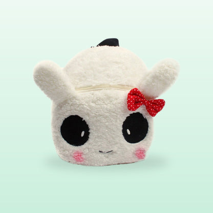 White bunny plush mini backpack with a red polka dot bow, on a mint green background