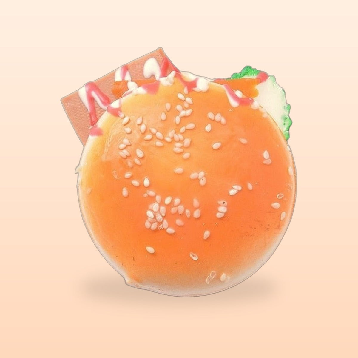 Burger slow rise bread squishy on a soft peach background