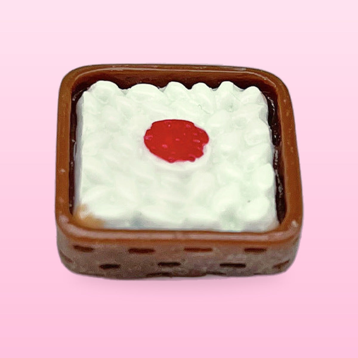 Rice box miniature food fridge magnet in a brown box with a red centre, on a pink background