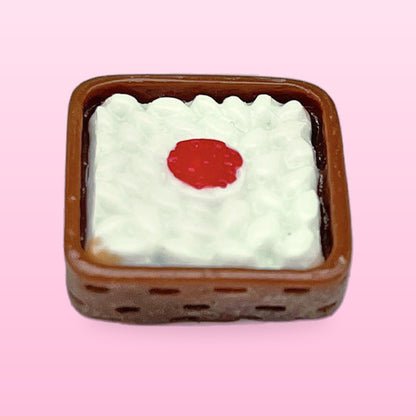 Rice box miniature food fridge magnet in a brown box with a red centre, on a pink background