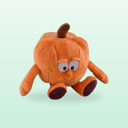 Fruit and veg buddies plush, Pumpkin, sitting on a mint green background